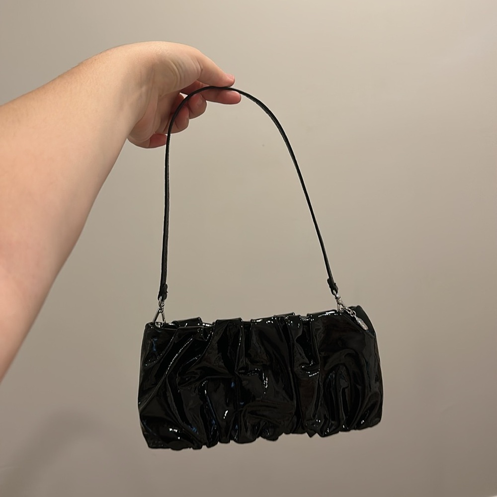 STAUD Bean Gathered Patent-leather Shoulder Bag in Black - Picture 2 of 5